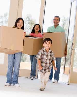 An image of family moving into apartment
